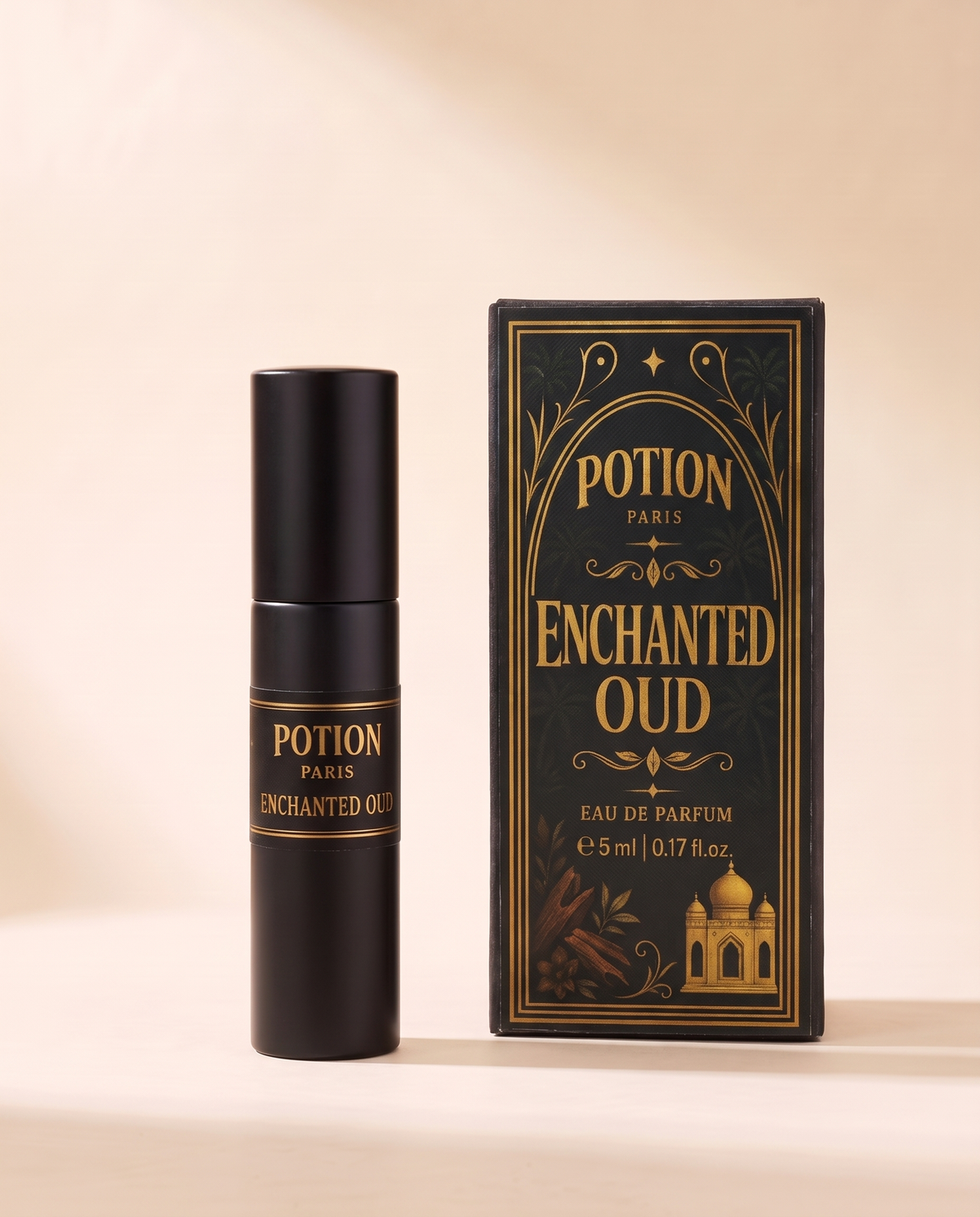 Enchanted Oud five millilitre atomiser beside its carton.